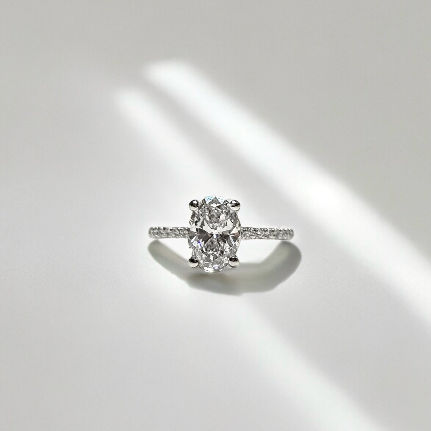 1.81 CT Oval Cut With Side Stones