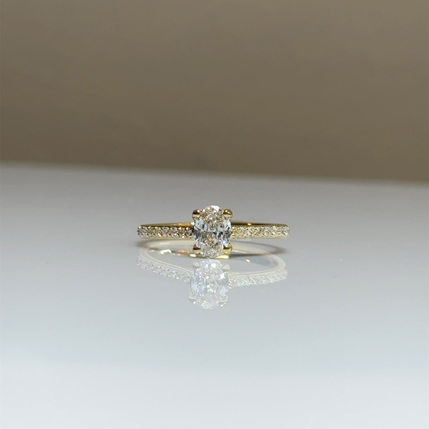 0.62 CT OVAL CUT DIAMOND RING