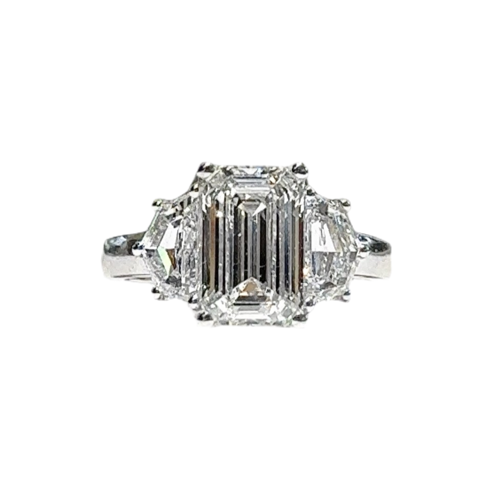 3.03 CT EMERALD CUT THREE STONE RING