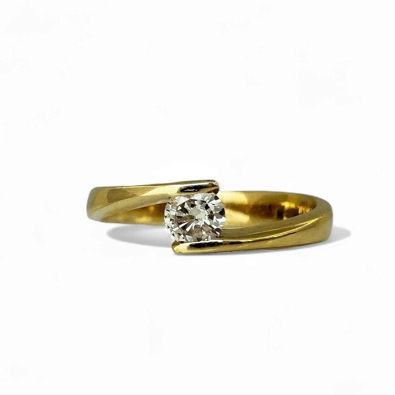 0.22CT ROUND SOLITAIRE RING