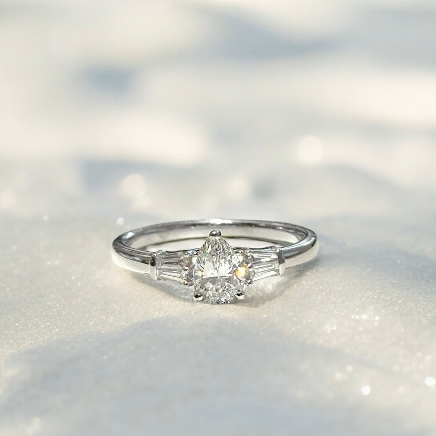 Pear Solitaire Trilogy Diamond Ring