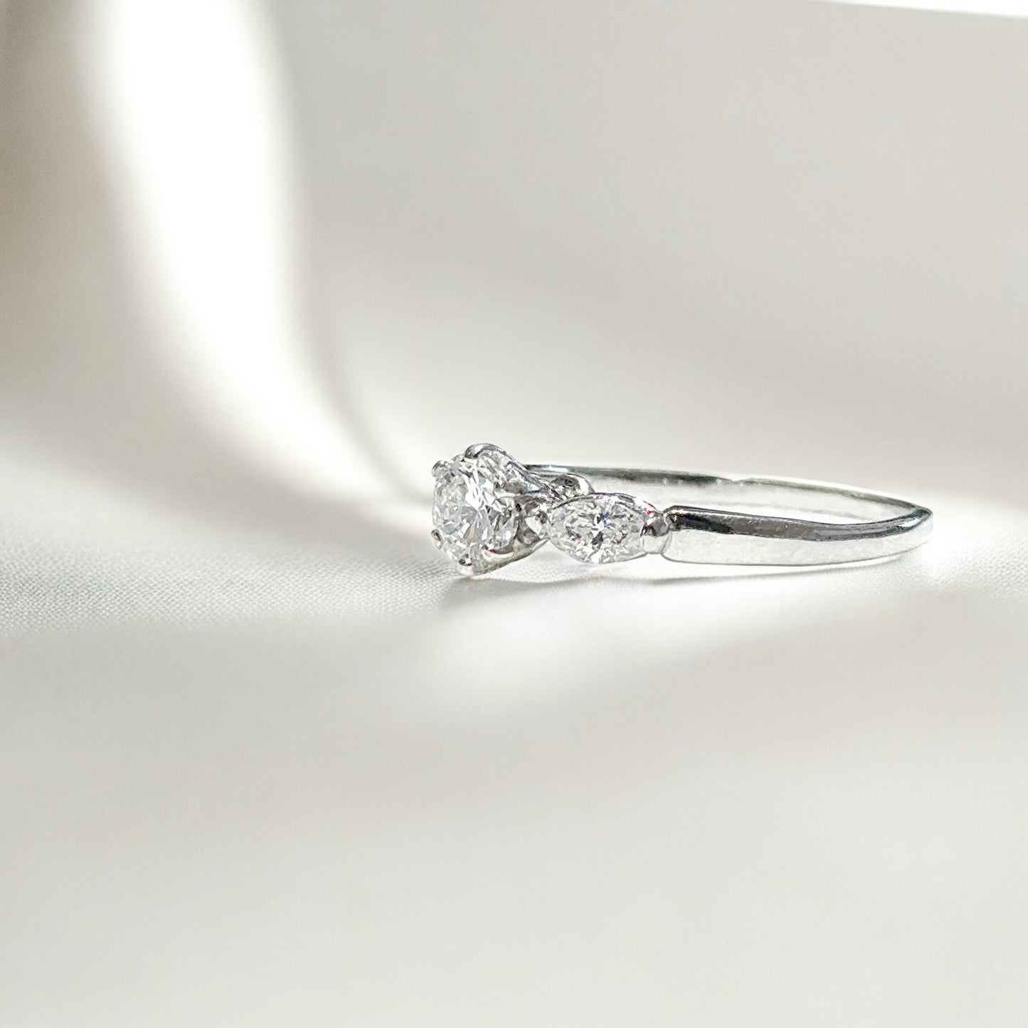 Round Cut Solitaire Ring With Sides Marquise Shape