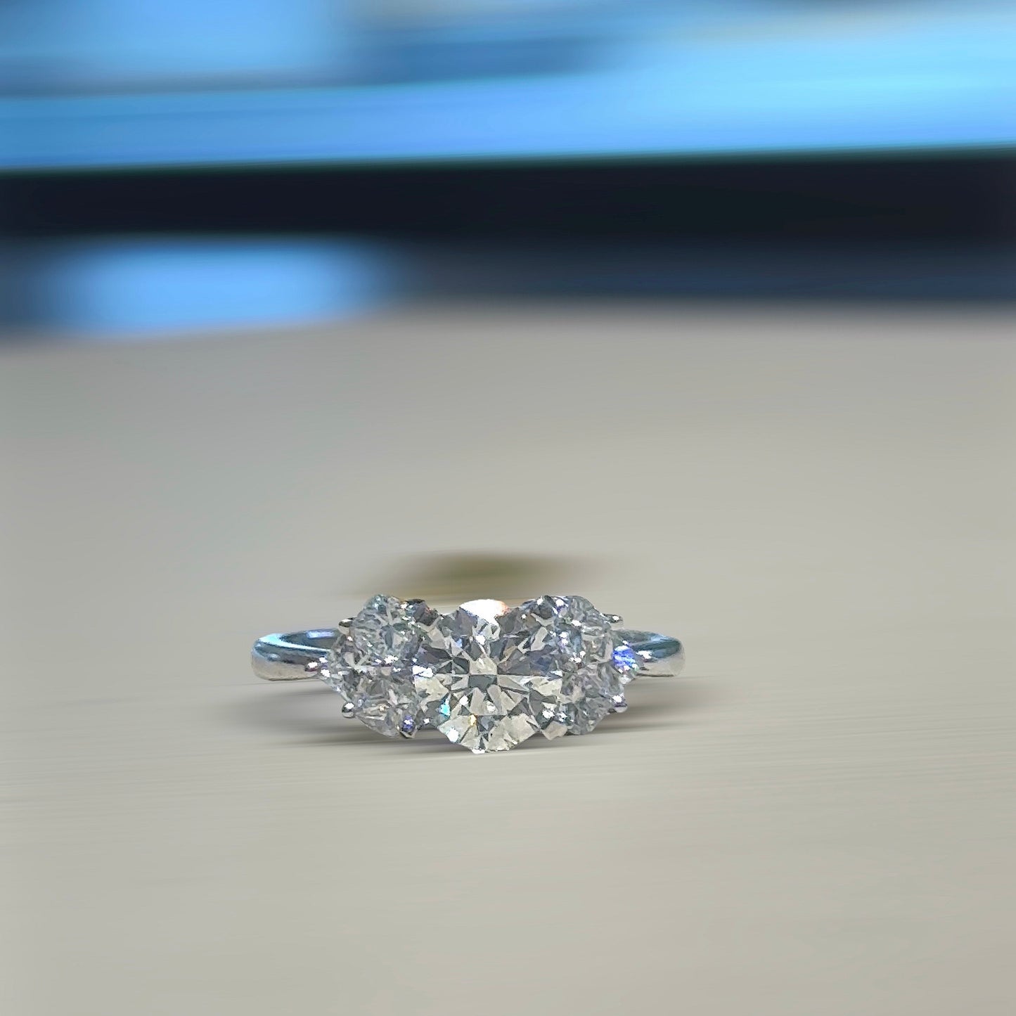 1.08 CT ROUND CUT SOLITAIRE & SIDE PRINCESS CUT