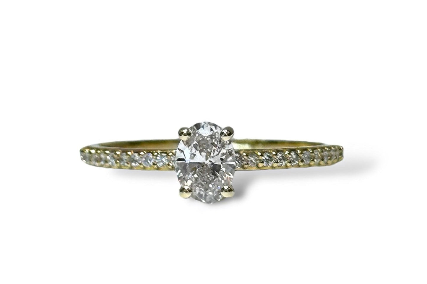 0.53 CT OVAL CUT SOLITAIRE PAVÉ RING