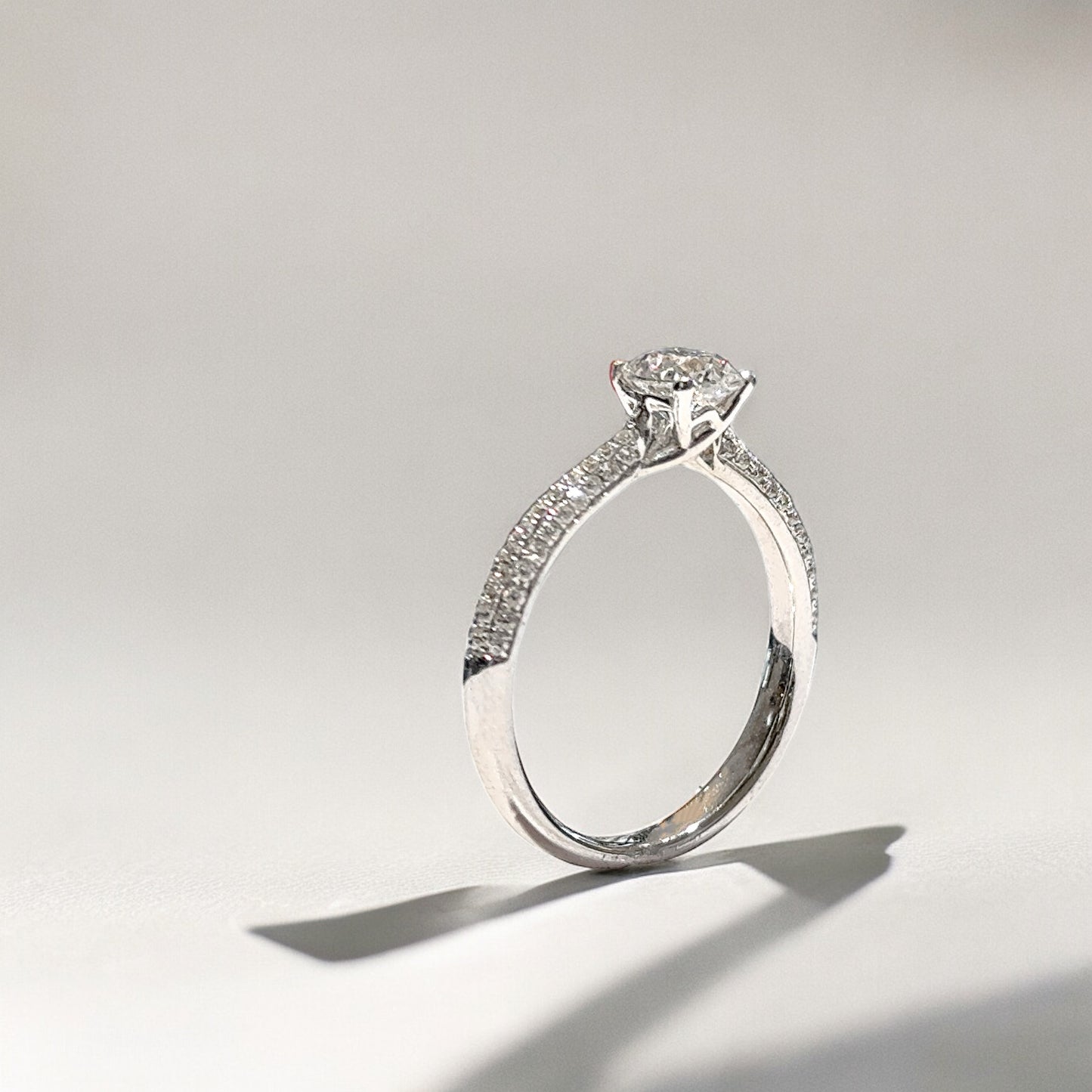 0.68 CT ROUND CUT ENGAGEMENT PAVÉ RING