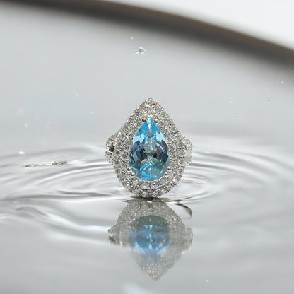 DOUBLE HALO LIGHT BLUE TOPAZ RING